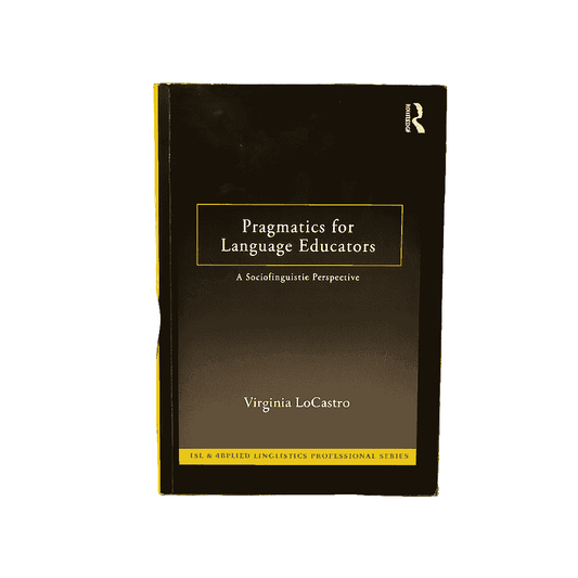 Book titled 'Pragmatics for Language Educators' held by a hand with a blurred bookshelf background