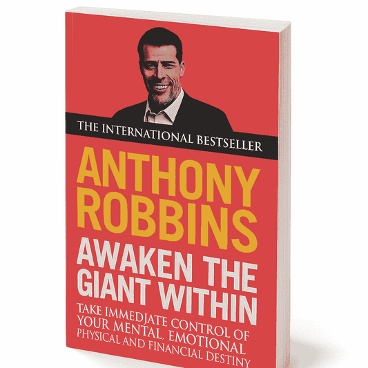 Book cover of 'Awaken the Giant Within' by Anthony Robbins with a red background and yellow text.
